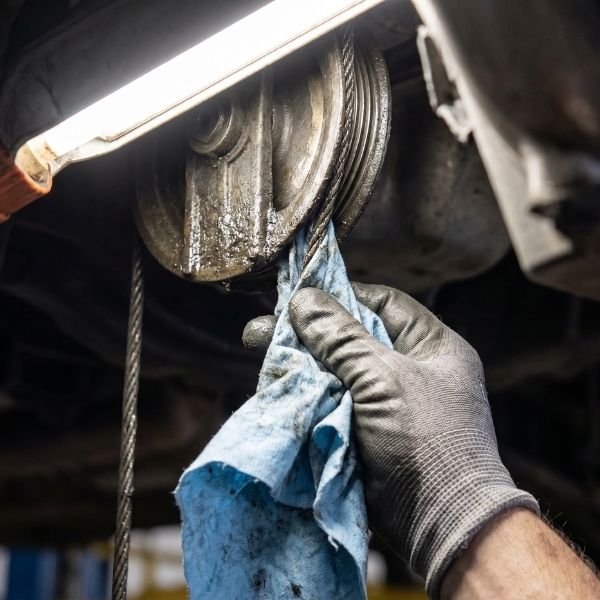 A rag caught in auto lift gears.